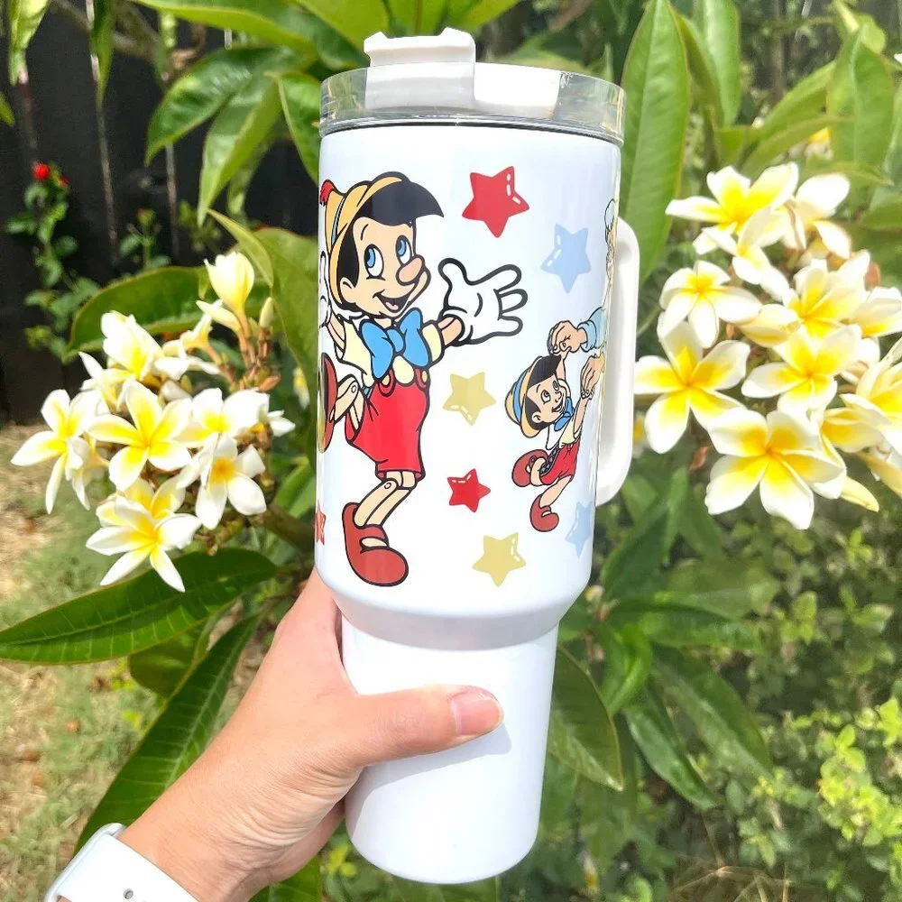 Disney Pinocchio 40 oz Tumbler/Water bottle/Mug with hand carry handle. Large c